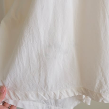 antique smock with smily hairpins
