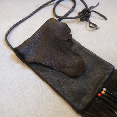 leather shoulder bag with fringe