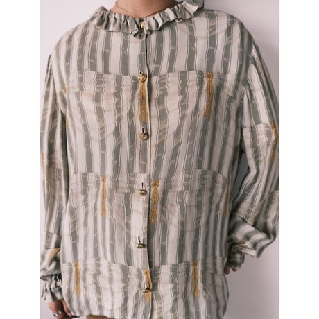 frill blouse with gold buttons