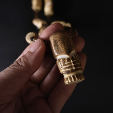 ZUNI / “owl” fetish necklace and pierce