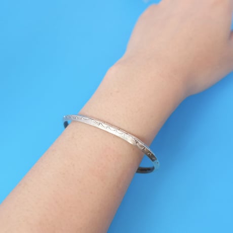 navajo "Elaine Tahe" stamp bangle