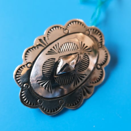 navajo / concho brooch
