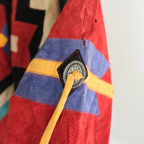 colorful leather designed jacket with concho