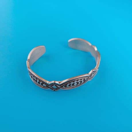 navajo "Arnold Blackgoat" / stamp work bangle