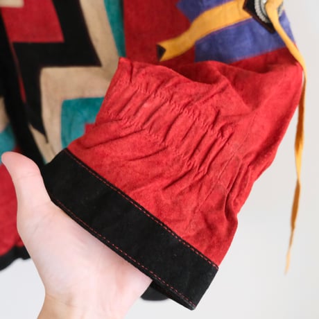 colorful leather designed jacket with concho