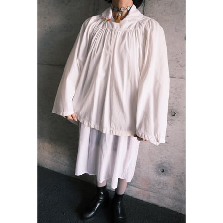 antique smock with smily hairpins