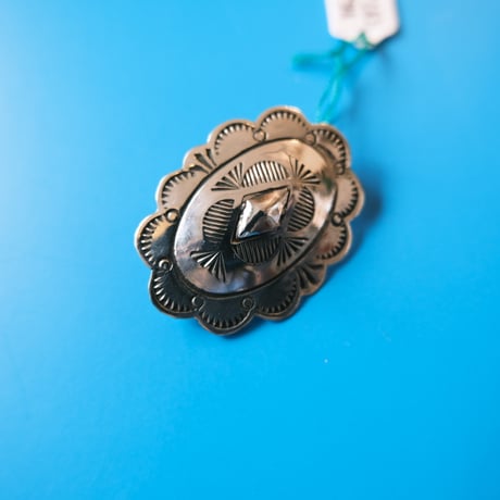 navajo / concho brooch