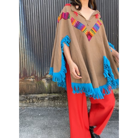 fringe poncho with animal