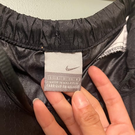 NIKE / nylon pants / cream yellow