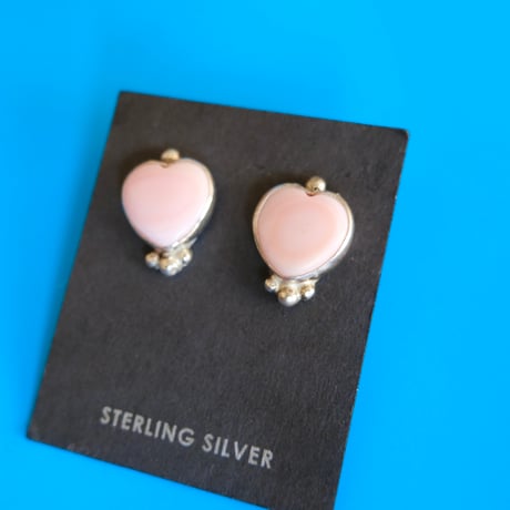 navajo / conch shell heart pierce