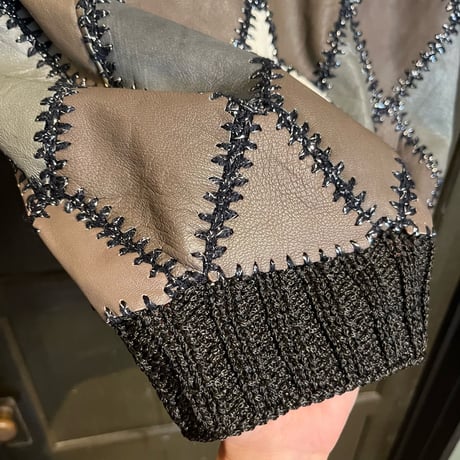 leather × crochet patchwork vest