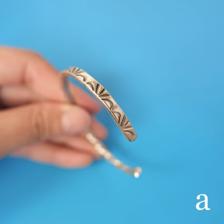 navajo "Elaine Tahe" twist × stamp work bangle