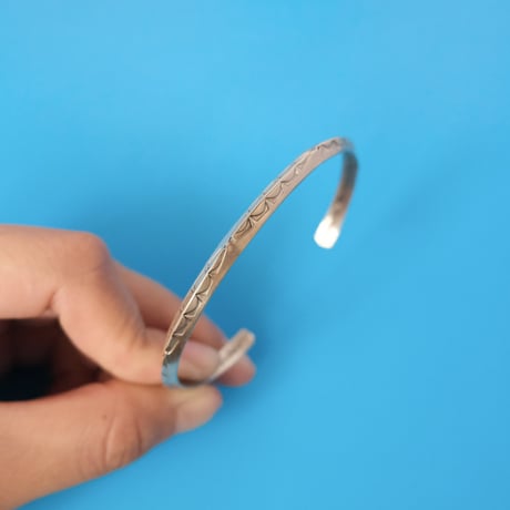 navajo "Elaine Tahe" stamp bangle