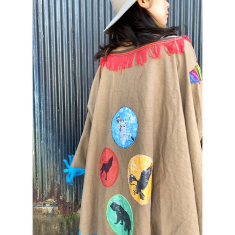 fringe poncho with animal