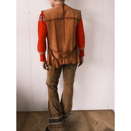 leather × crochet vest