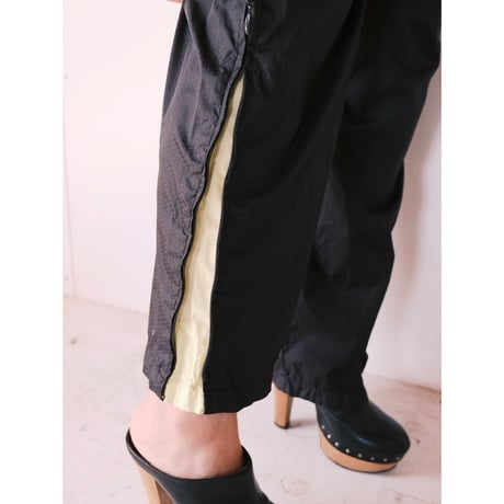 NIKE / nylon pants / cream yellow