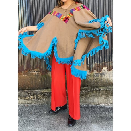 fringe poncho with animal