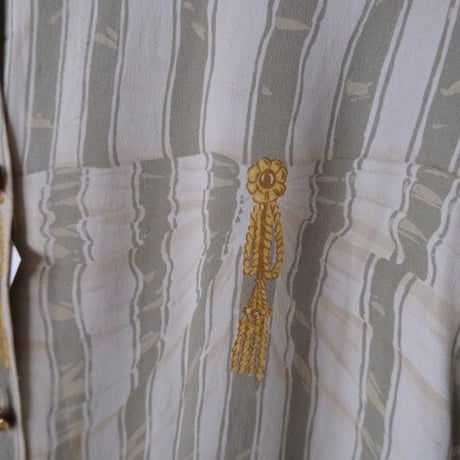 frill blouse with gold buttons