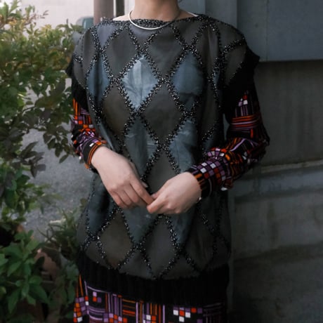 leather × crochet patchwork vest