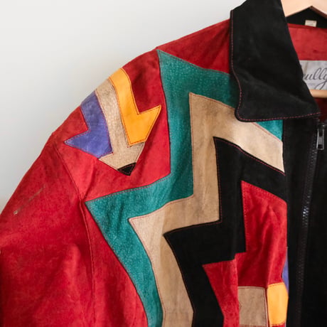 colorful leather designed jacket with concho