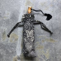 ツタエノヒガサ   ウサギノタスキ　黒菊