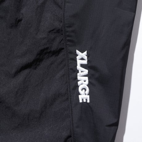 XLARGE | NYLON TRACK PANTS(BLACK)