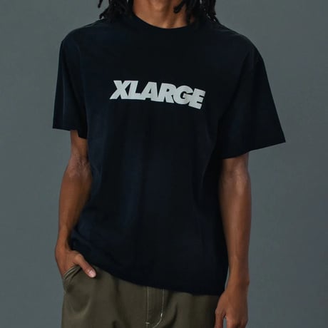 XLARGE | DISCHARGE PRINTED STANDARD LOGO S/S TEE(BLACK)