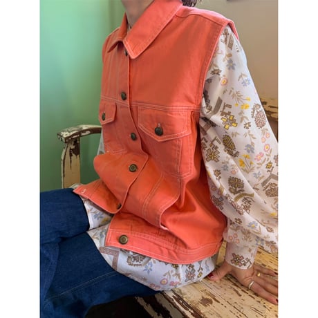 coral pink sleeveless jacket