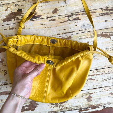 yellow lether bag