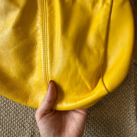 yellow lether bag