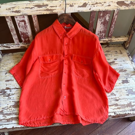 orange silk shirt