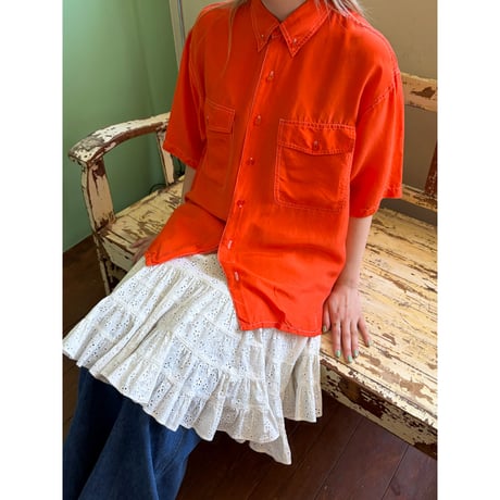 orange silk shirt