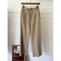 beige tuck pants