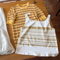 gold border tank top