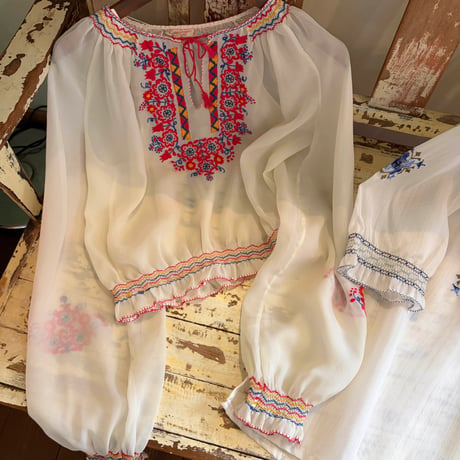 see-through Tyrolean blouse