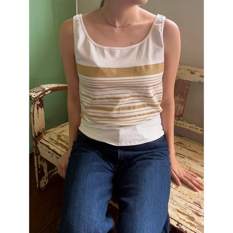 gold border tank top