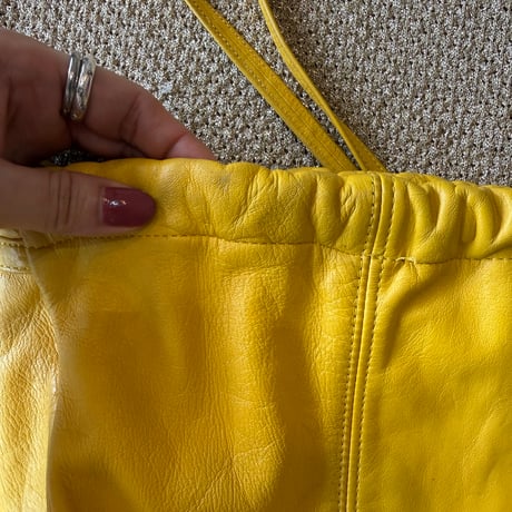 yellow lether bag