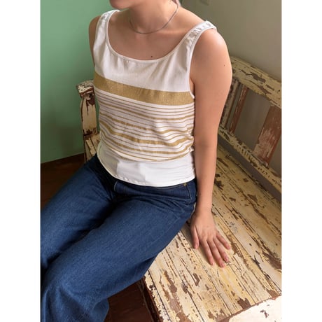 gold border tank top