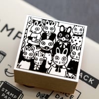 square stamp | Yumi kitagishi　Rabbits are crammed together