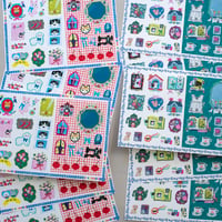 yumi kitagishi A5 decorative paper, 2 designs, 5 sheets each.