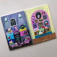 Yumi Kitagishi's sketchbook　 "Daytime cat, nighttime cat"
