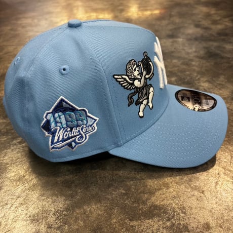 USA買付  New York Yankees World Series 1999 Cupid Sky Blue Edition  9FORTY A-Frame　　NEWERA-67