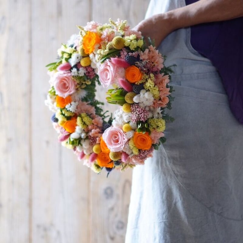 ◉受注販売 プリザのバラを使ったオレンジイエロー系のリース | flower