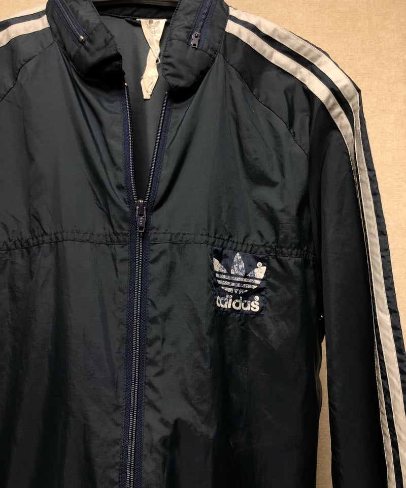 エイティーズ万国旗タグヴィンテージアディダス〉80年代adidas万国旗