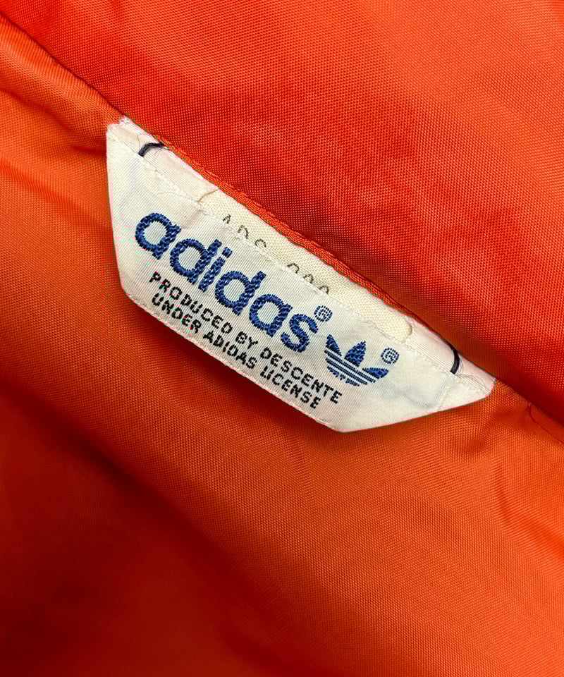 エイティーズデサントタグORANGE × BLACK〉80年代デサントタグadidas