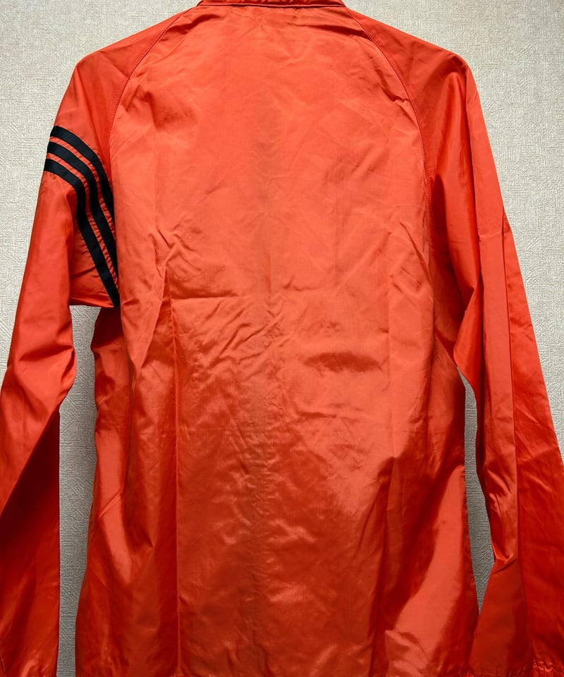 エイティーズデサントタグORANGE × BLACK〉80年代デサントタグadidas