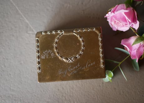 Metal box for stamps