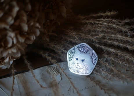 CAT brooch