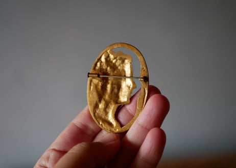 Bronze Face Brooch