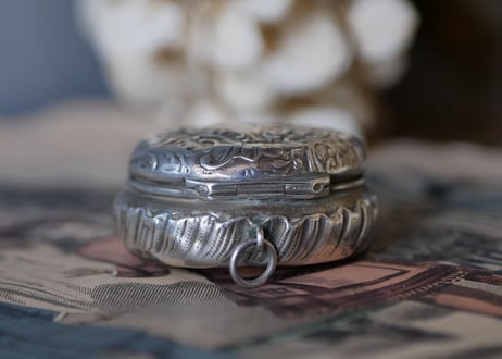Compact case, Monogram